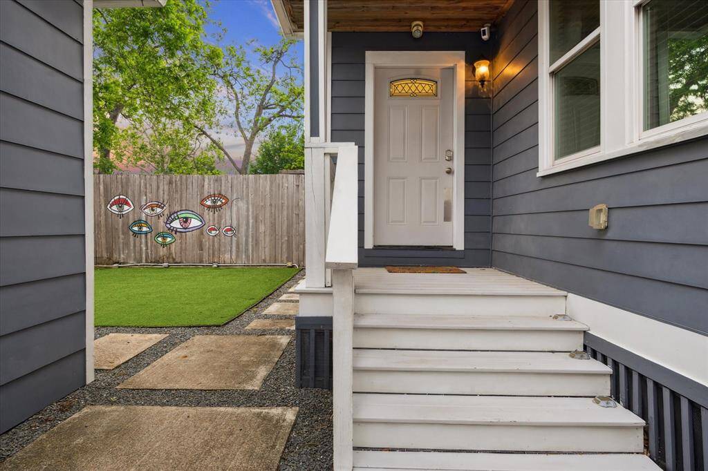 Here is a view of the back patio door leading to the backyard and garage. All installed security cameras can stay with the home.
