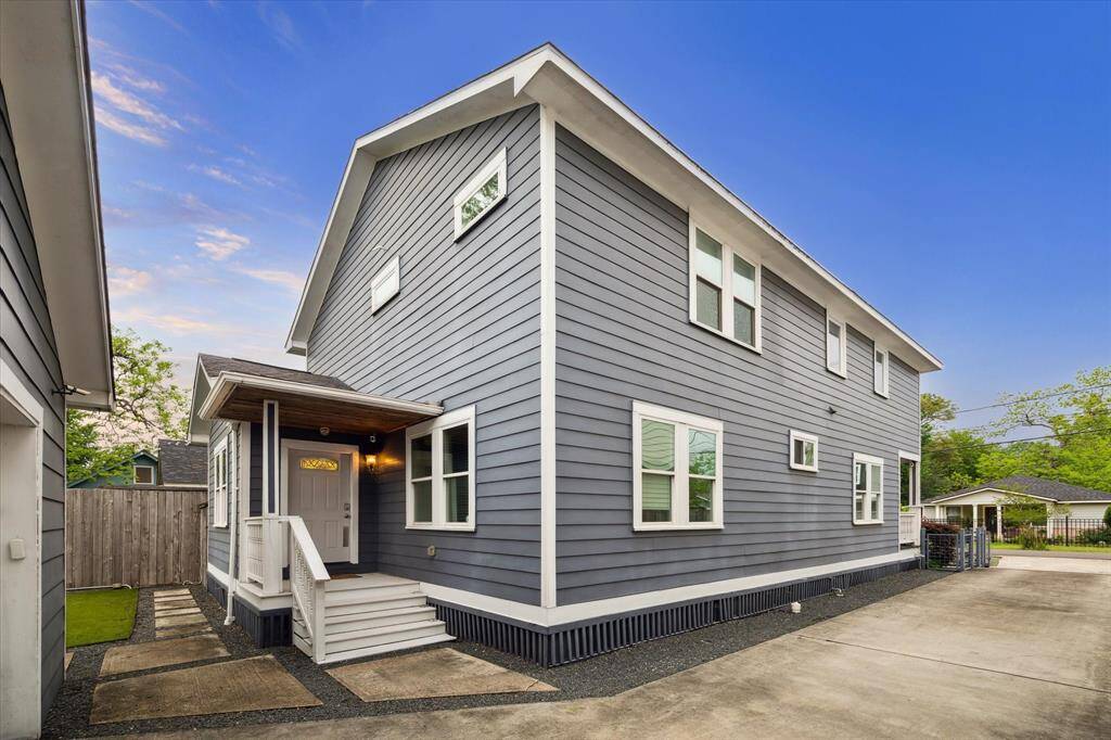 Here is a side view of 1111 looking out towards Adele Street down the long driveway. This can be additional entertainment space for large gatherings!