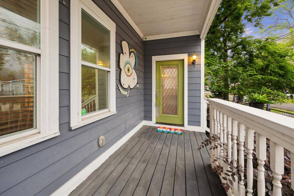 The front patio welcomes you as you enter thiselevated home on pier and beam foundation.