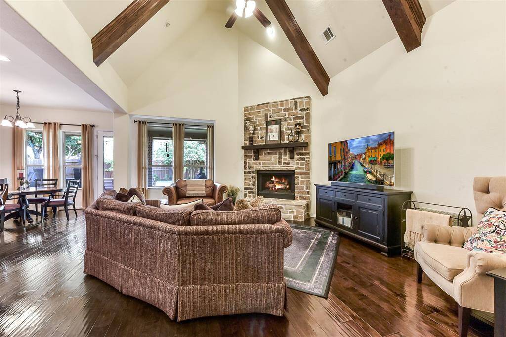 Gorgeous wood beans and stone fireplace!