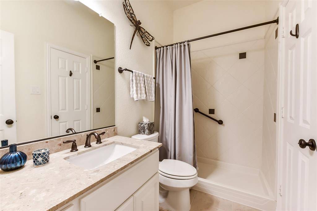 Ensuite downstairs bath.