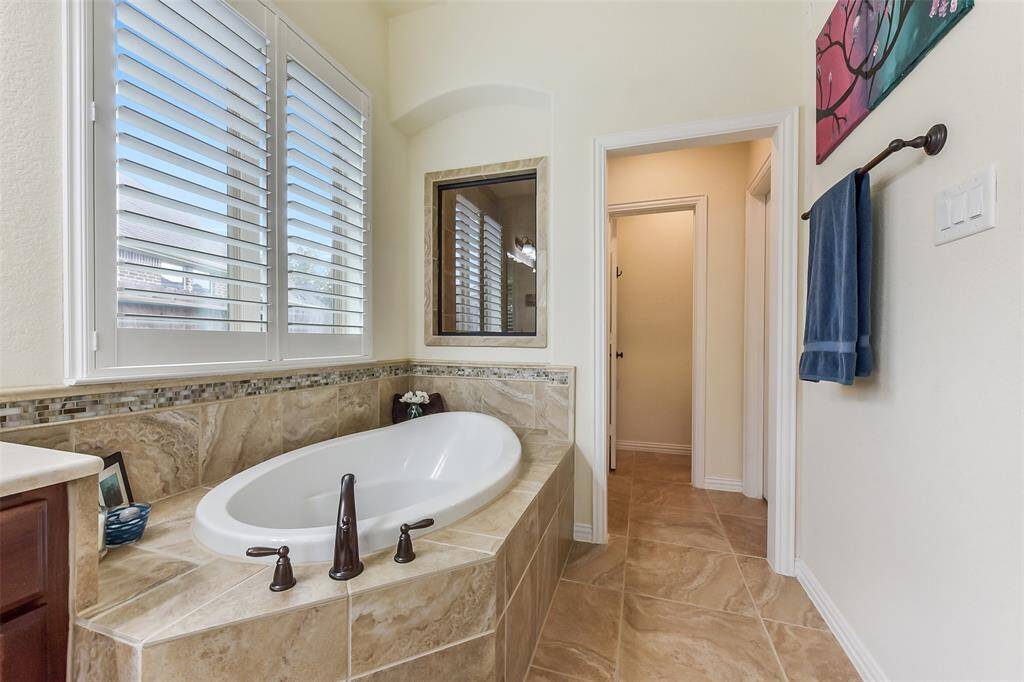 Wonderful soaking tub with separate shower.