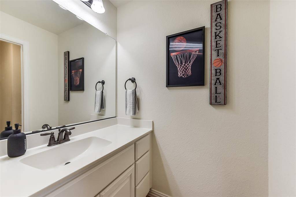 Private vanity with shared tub/shower combo.