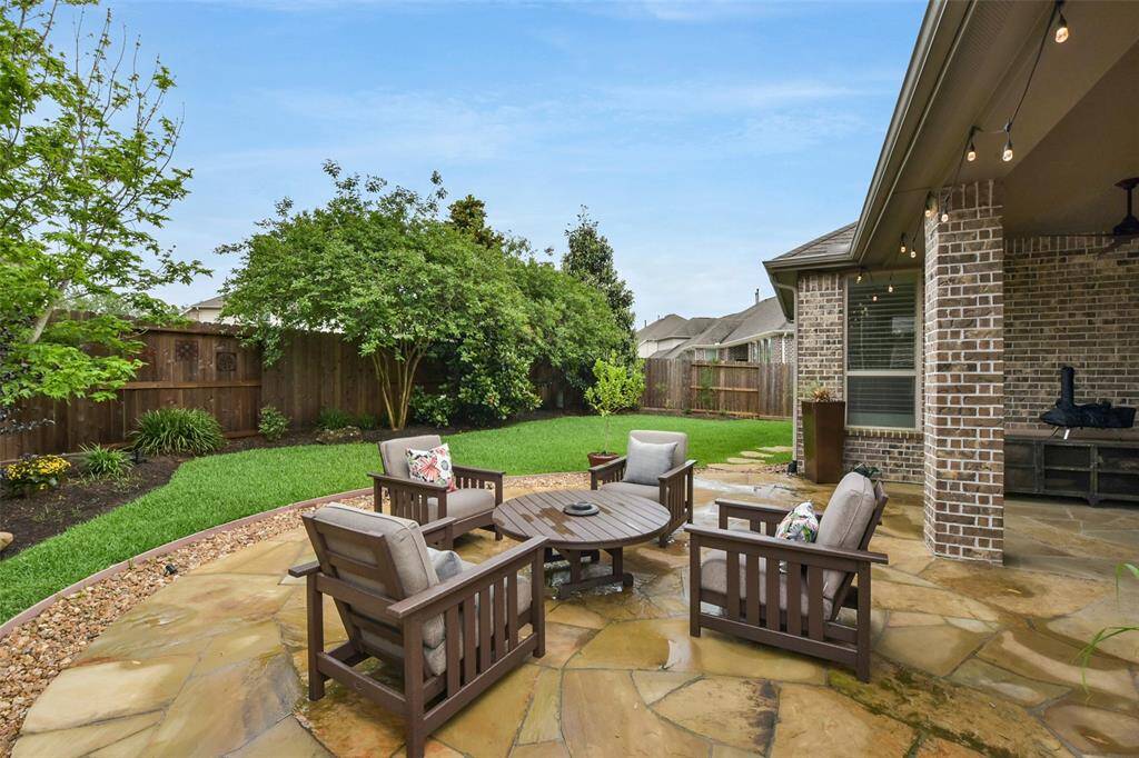Beautiful flagstone patio and fire pit.