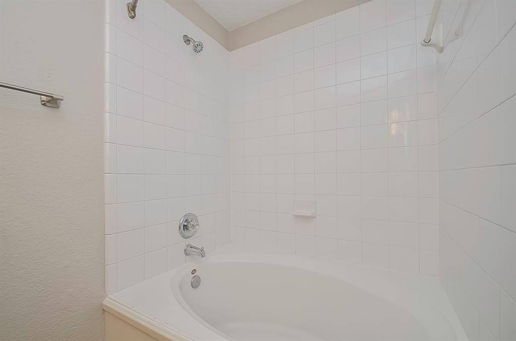 Here's another perspective of the spacious garden tub, inviting you to indulge in a relaxing soak.