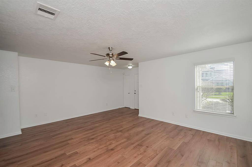 This living room will accommodate any large living room furniture, you may have or need. Has so much potential