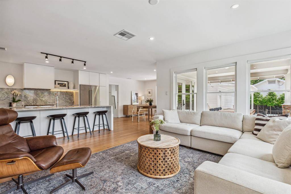With expansive formal and casual living spaces, this home is equally adept at large-scale entertaining and busy daily life.