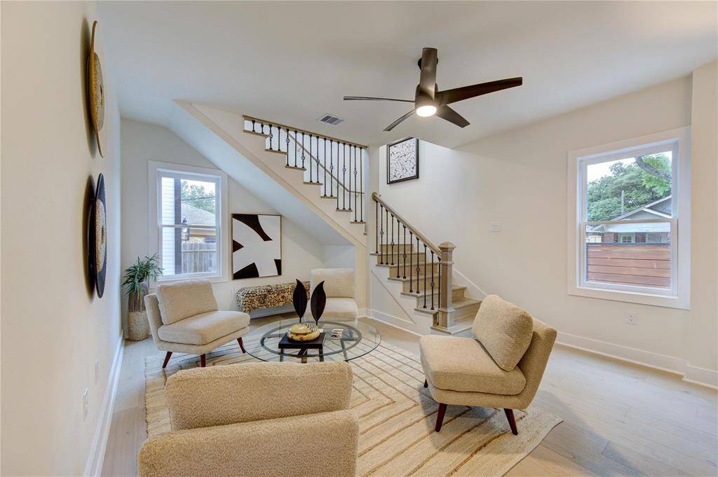 Second living space downstairs located outside of the primary suite.