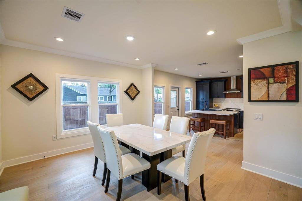 Dining/breakfast room flows seamlessly from kitchen.