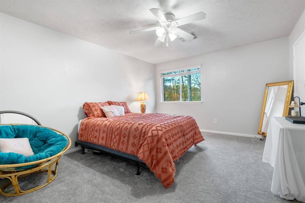 All upstairs bedrooms have an abundance of space! This is the first of four upstairs!