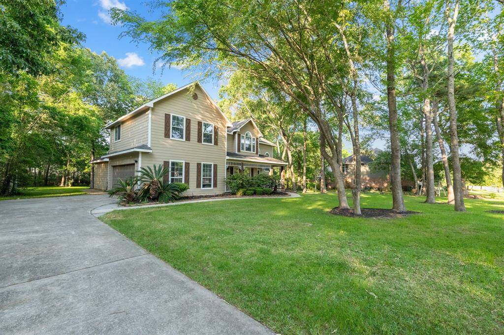 The property has a long driveway with easy access to the backyard