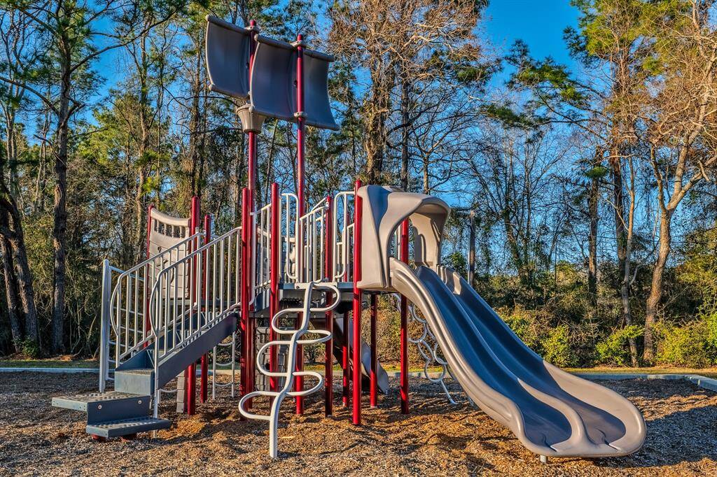 Hidden behind this great playground are basketball courts and a fishing pond