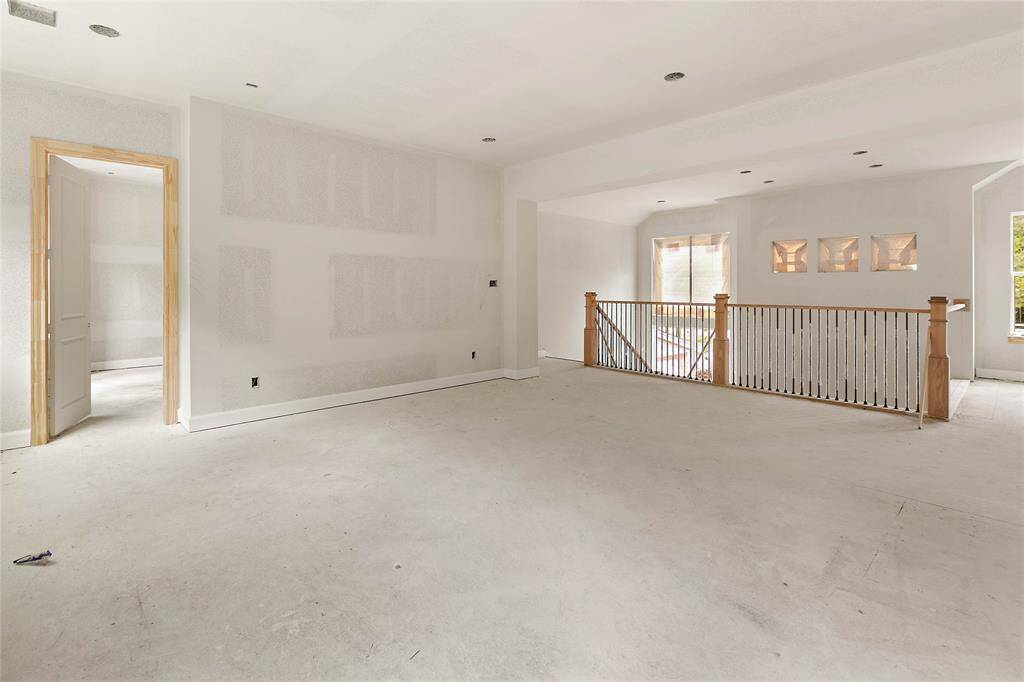 This spacious game room is certain to be a popular hang-out for friends & family.