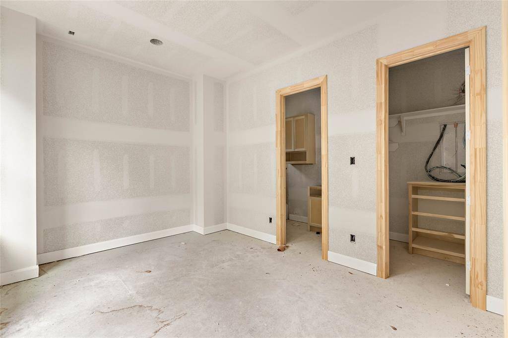 Upstairs are two spacious bedrooms, each with a private full bath.