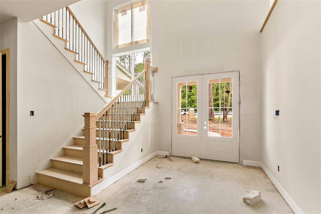 Light and bright 2-story foyer entry welcomes you home and makes a lasting first impression.