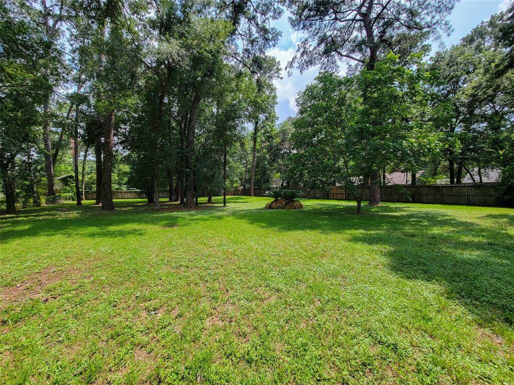 Lovely lot with mature trees ready for your custom built home in Mossy Oaks Estates.