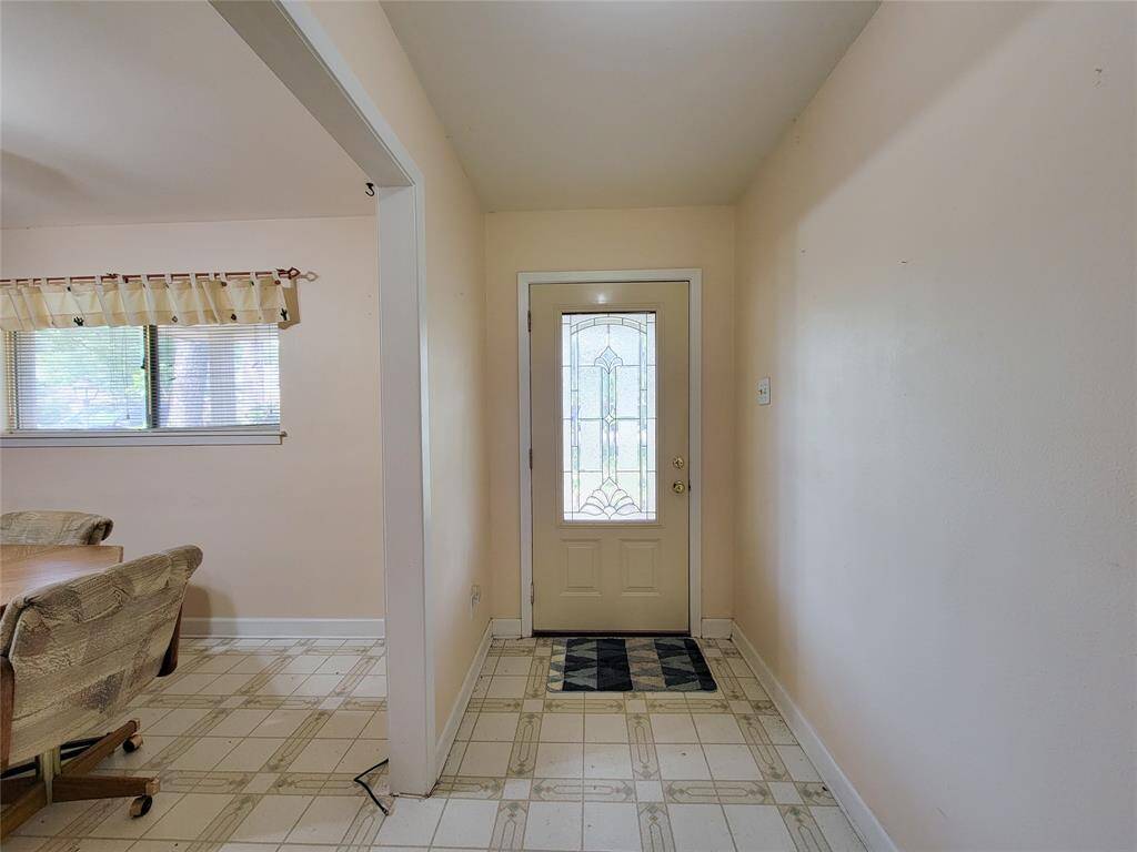 Entry with leaded glass door.