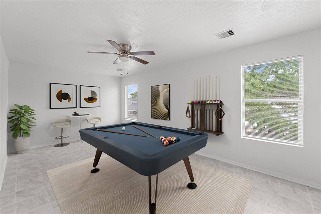 Virtually Staged: Fabulous game room - perfect for a kids playroom or unique adult hangout, located directly upstairs!