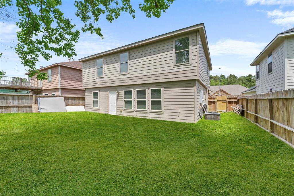 Welcome to your new backyard! Check out all of that wonderful green space for the kids and pets to run around in.
