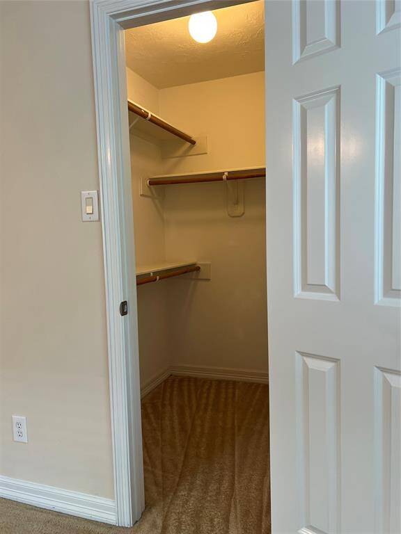 Secondary bedroom walk-in closet