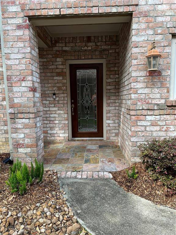 Covered Entrance. Nicely landscaped -