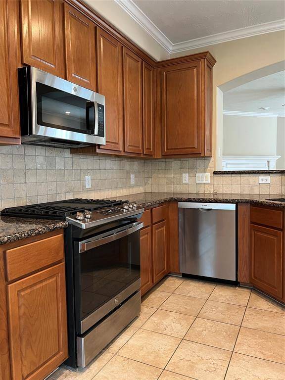 Kitchen - open to LR and DR.