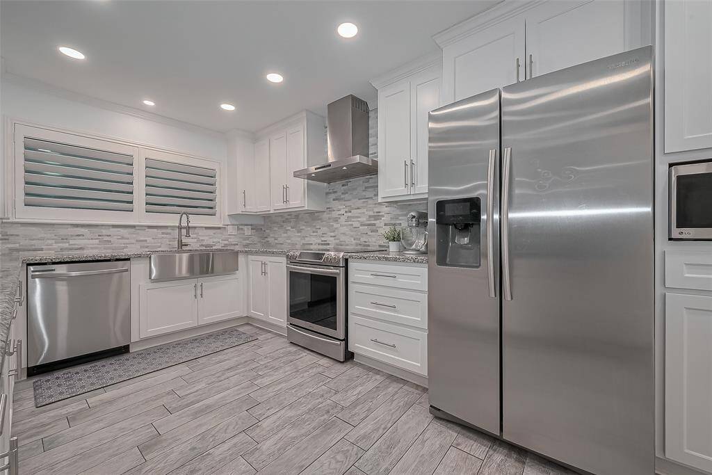 Fully remodeled kitchen - stainless steel refrigerator stays