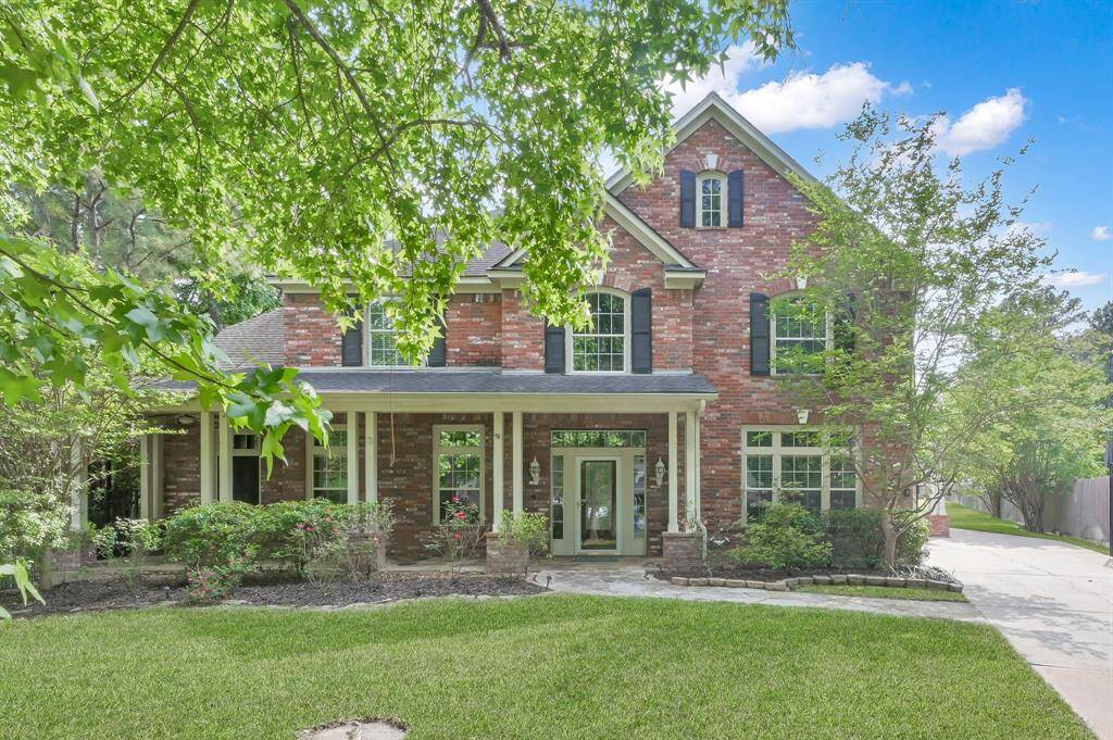 Greet guests as you open a wood-stained front door with leaded glass insert. Side lights and a transom window allow additional light into the foyer. There is also a lockable full glass storm door you can leave open to more enjoy the front yard view while still having protection from the outdoors.