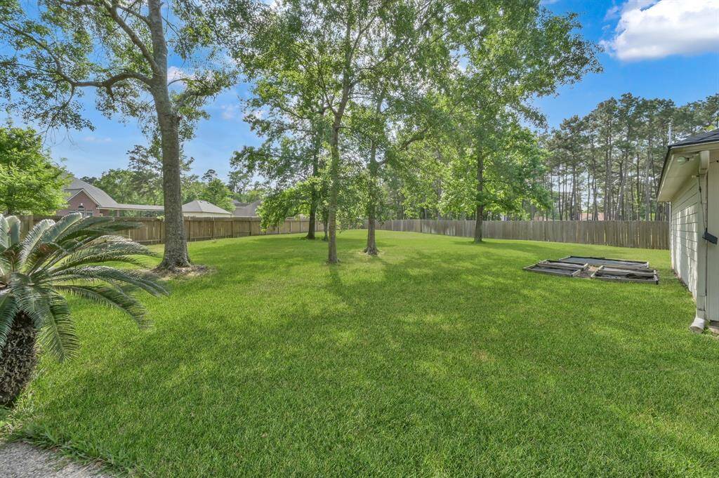One of the top reasons people love living in Mostyn Manor Estates are the sprawling lots enjoyed here. This .645-acre lot has most of the useable space in the back yard providing a vast area of green lawn for all kinds of activities in addition to the pool and spa. There are even garden beds behind the garage ready for planting flowers, herbs or veggies! A sprinkler system keeps the lawn green in the warmer months of the year.