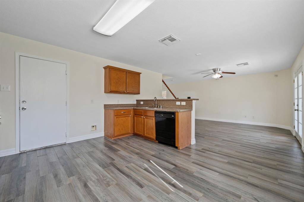 Extended counter space and natural light in the kitchen.