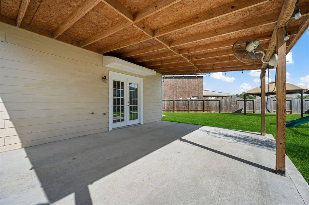 Extended covered patio—perfect for outdoor dining and lounging.
