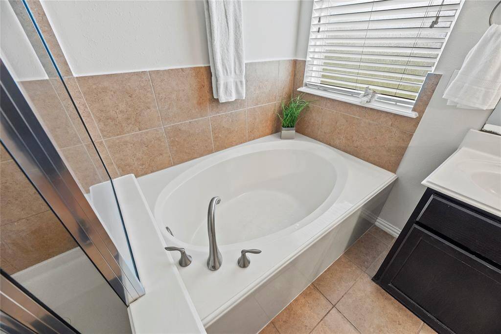 Relax in this spacious bath.
