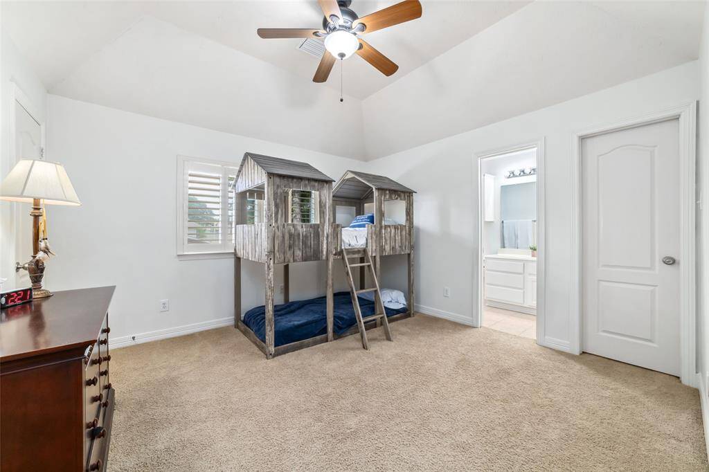 All of the upstairs bedrooms are very spacious, each with its own en-suite bathroom! This is the first of 4 upstairs bedrooms.