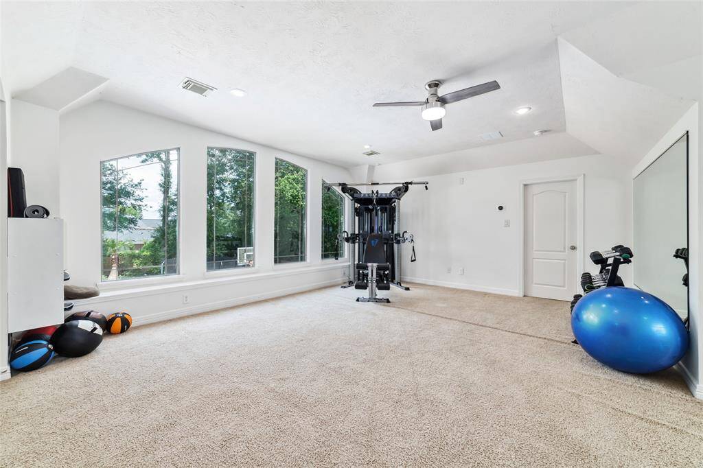 Another view of the flex space, including the wall of windows and fantastic view!