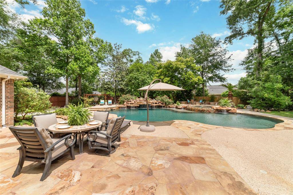 This exquisite backyard is made for outdoor entertaining - and the expansive patio will accommodate many guests.