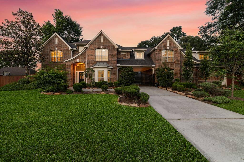 A view of the front of the home at dusk.
