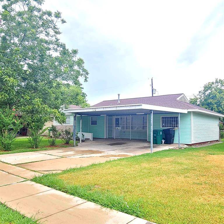 Nice curb appeal with carport