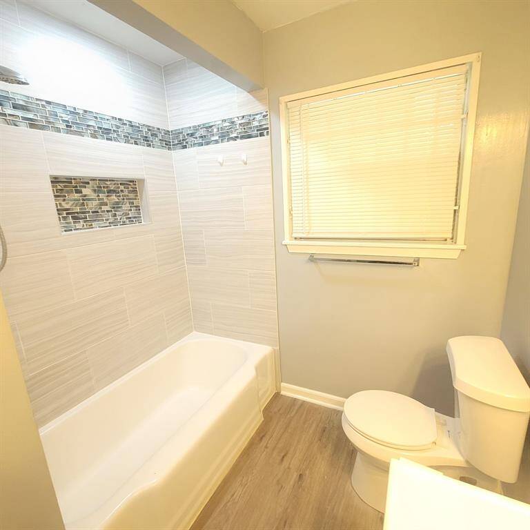 beautiful floors and shower walls just updated
