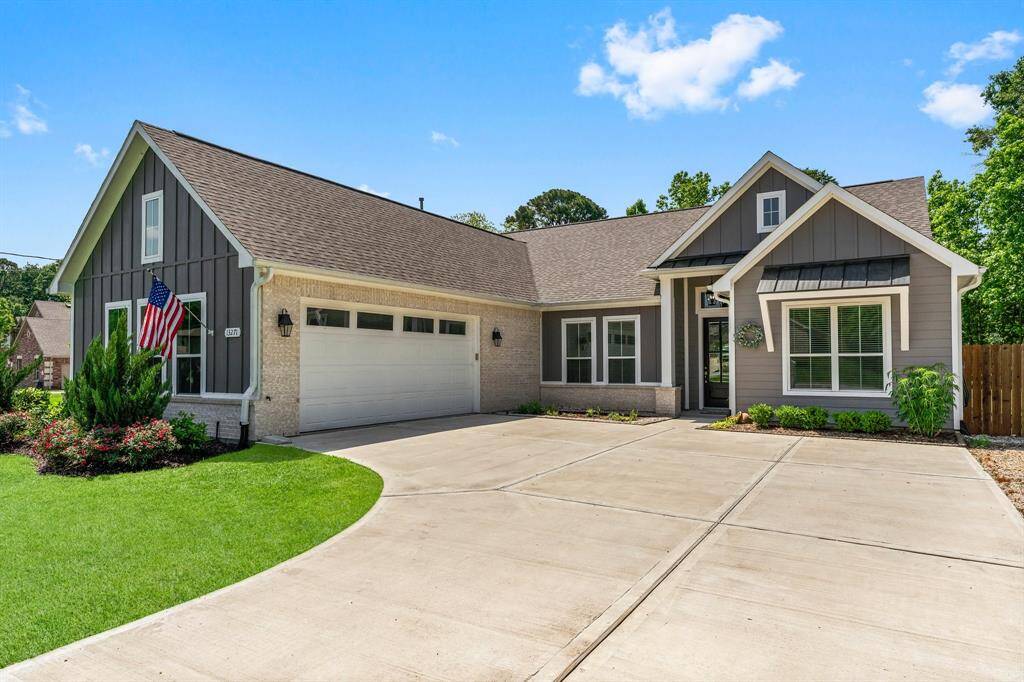 Welcome home to 13271 Hidden Trail Court! Built in 2022, this modern Farmhouse with Craftsman charm is nestled on a sprawling one-acre lot in the gated community of North Lake Estates.