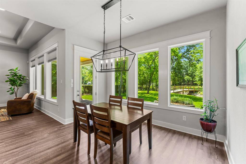 Beautiful views of the lush back yard from the dining room.