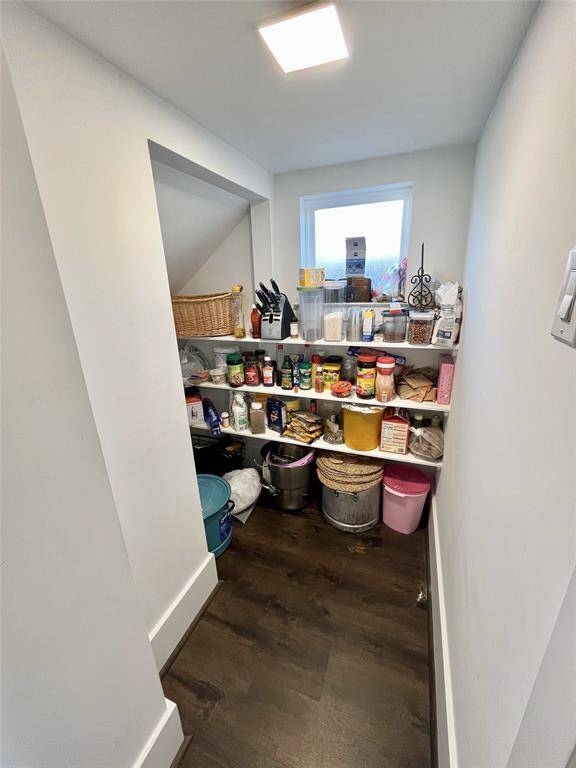 Full walk-in pantry next to the kitchen