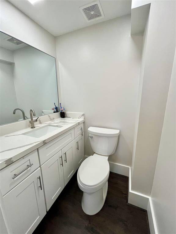 Powder bathroom on the first floor adds to the convenience and layout of the home