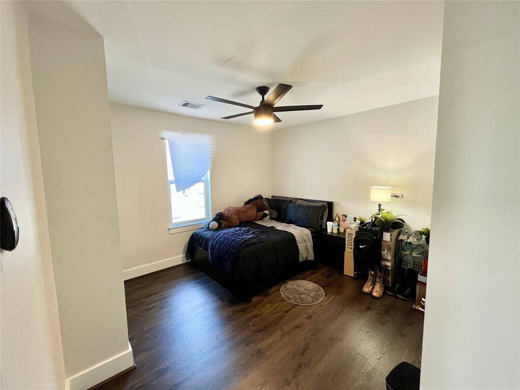 Large primary bedroom - all bedrooms feature vinyl flooring, ideal for minimizing dust and allergies, and extremely pet friendly