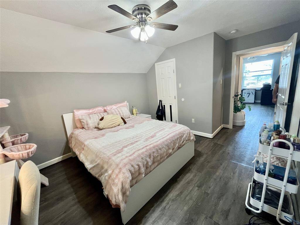 Second full size bedroom in 13505 Orleans B; new vinyl plank flooring, lights and ceiling fans