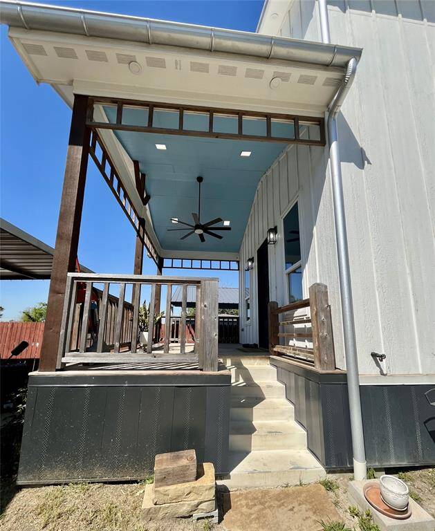 Stairs leading to the covered porch and entrance of 13505 Orleans A