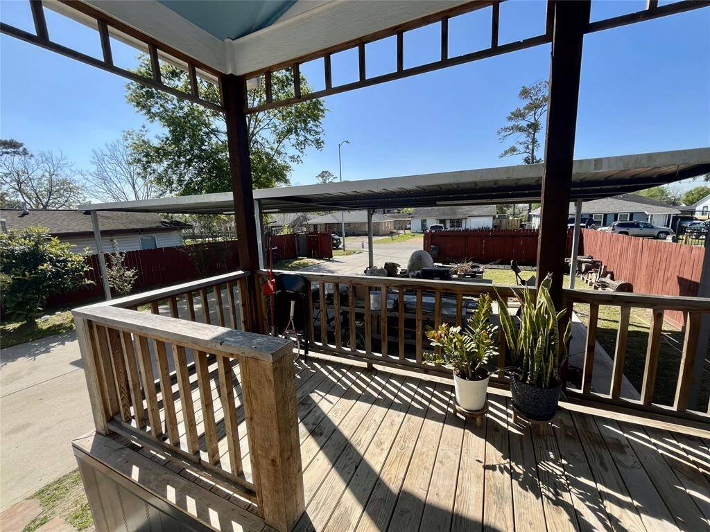 A view of the front yard from the porch of 13505 Orleans A