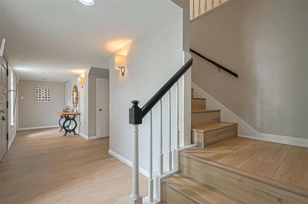 The stairs and second floor has all new vinyl floors (2025).