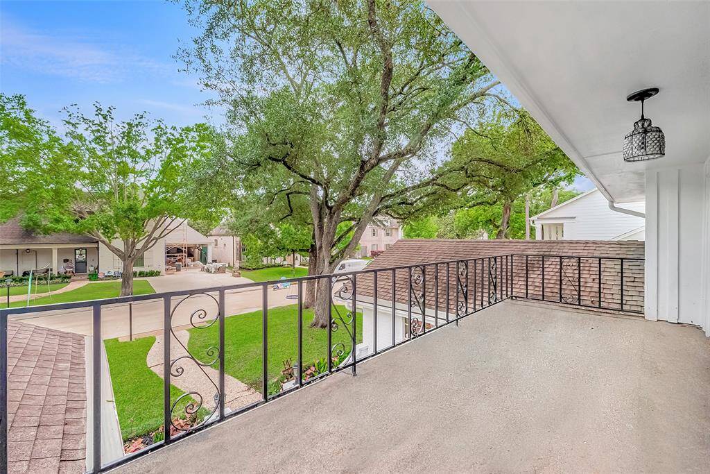 Balcony with french doors leading out to the street.