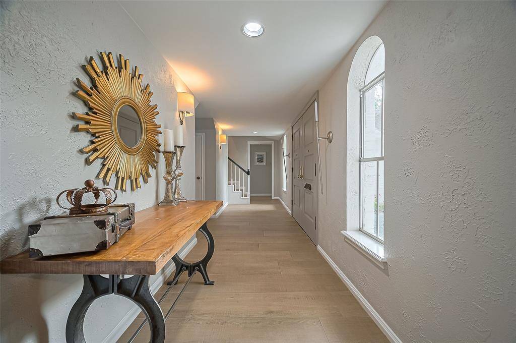 Gorgeous wood-like tile through out the first floor except the game room.