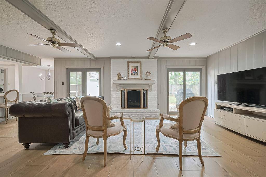 The living looks out the backyard and has a lot of natural light.